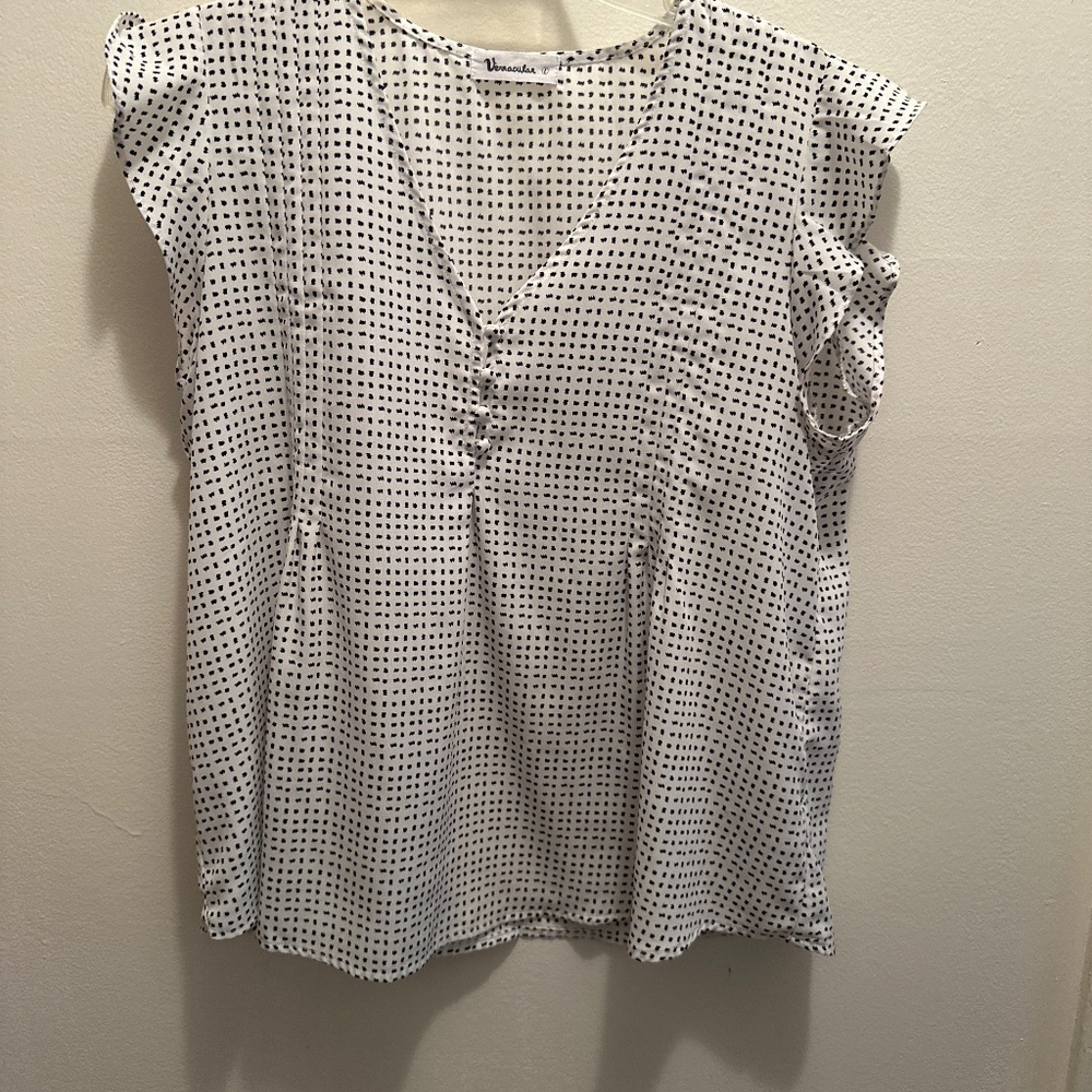 Vernacular sleeveless polyester to size L VGC